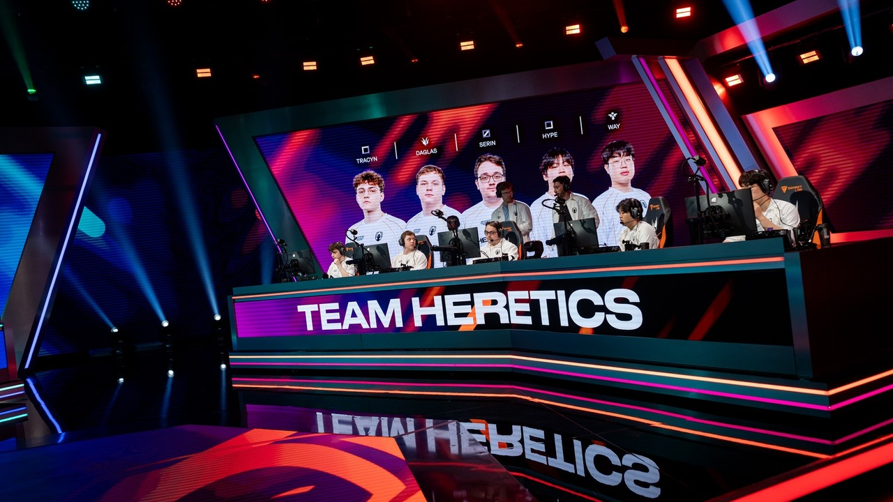 League of Legends teams sit at their computers during an LEC match