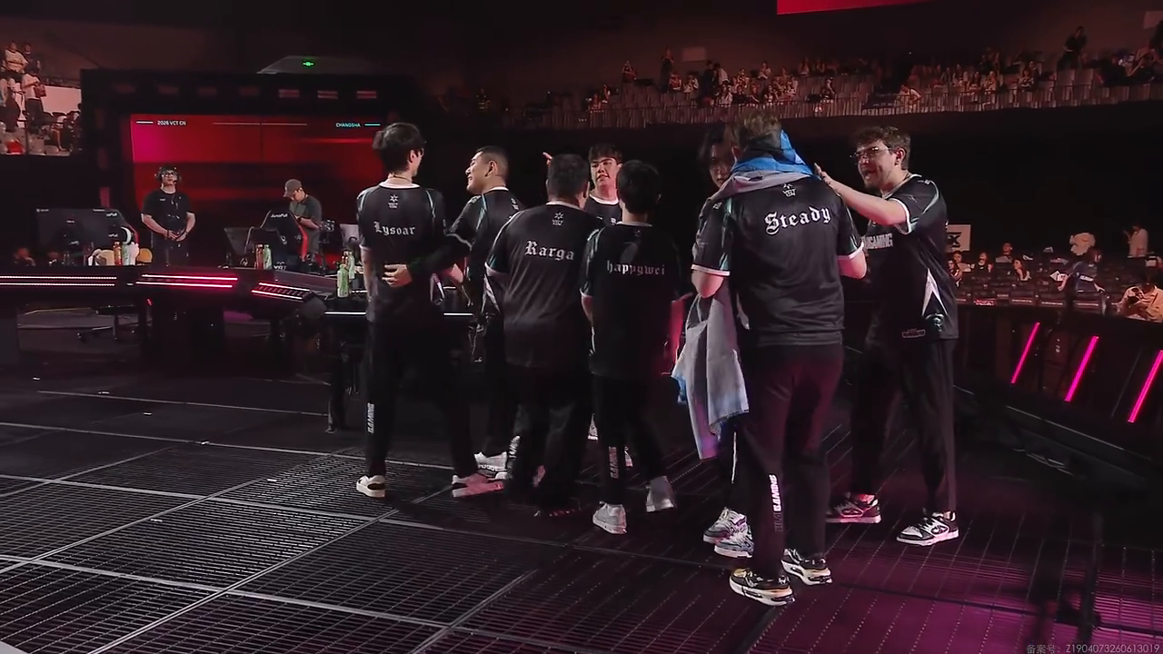 Xi Lai Gaming players gather on stage after defeating All Gamers