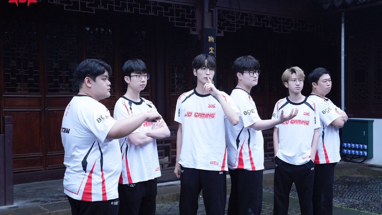 JDG Esports Valorant players stand together in white team shirts