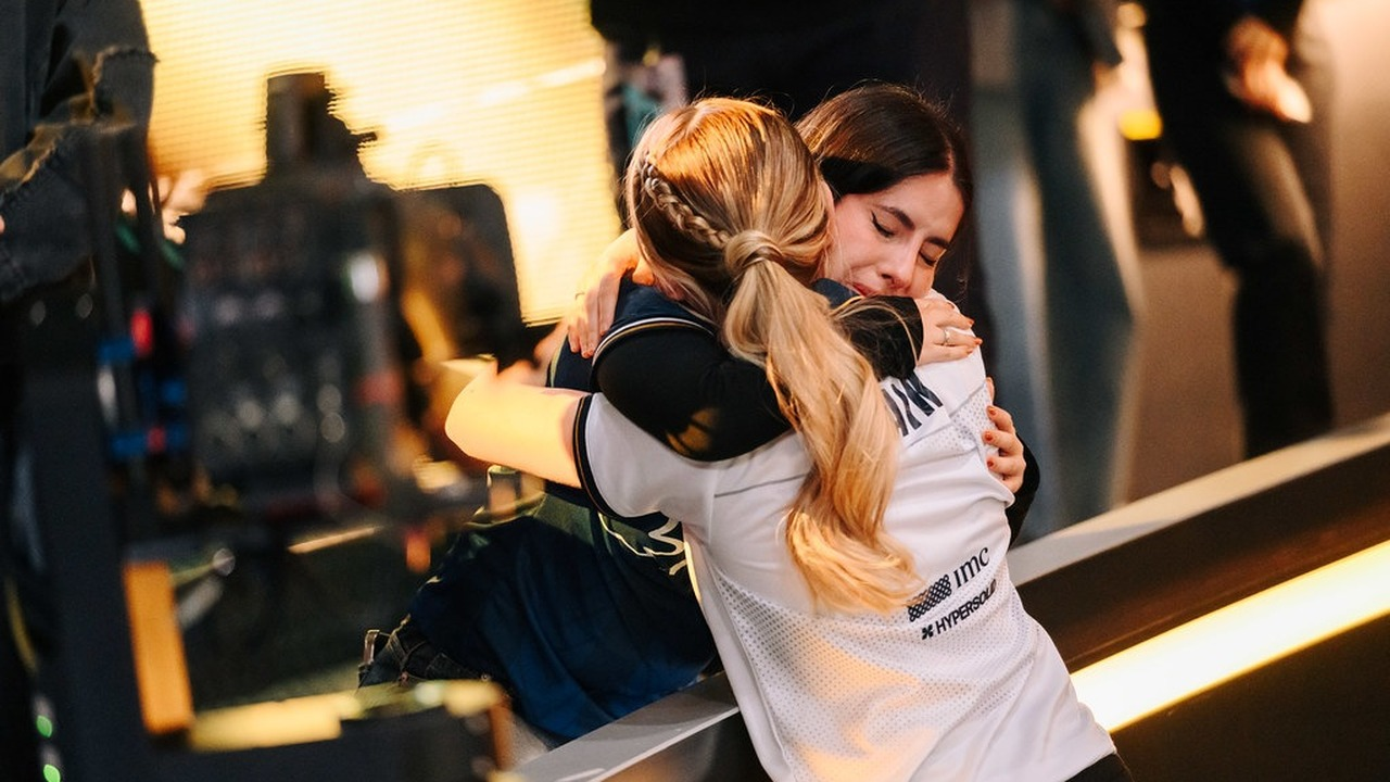A MIBR GC player embraces an opponent after a Game Changers match