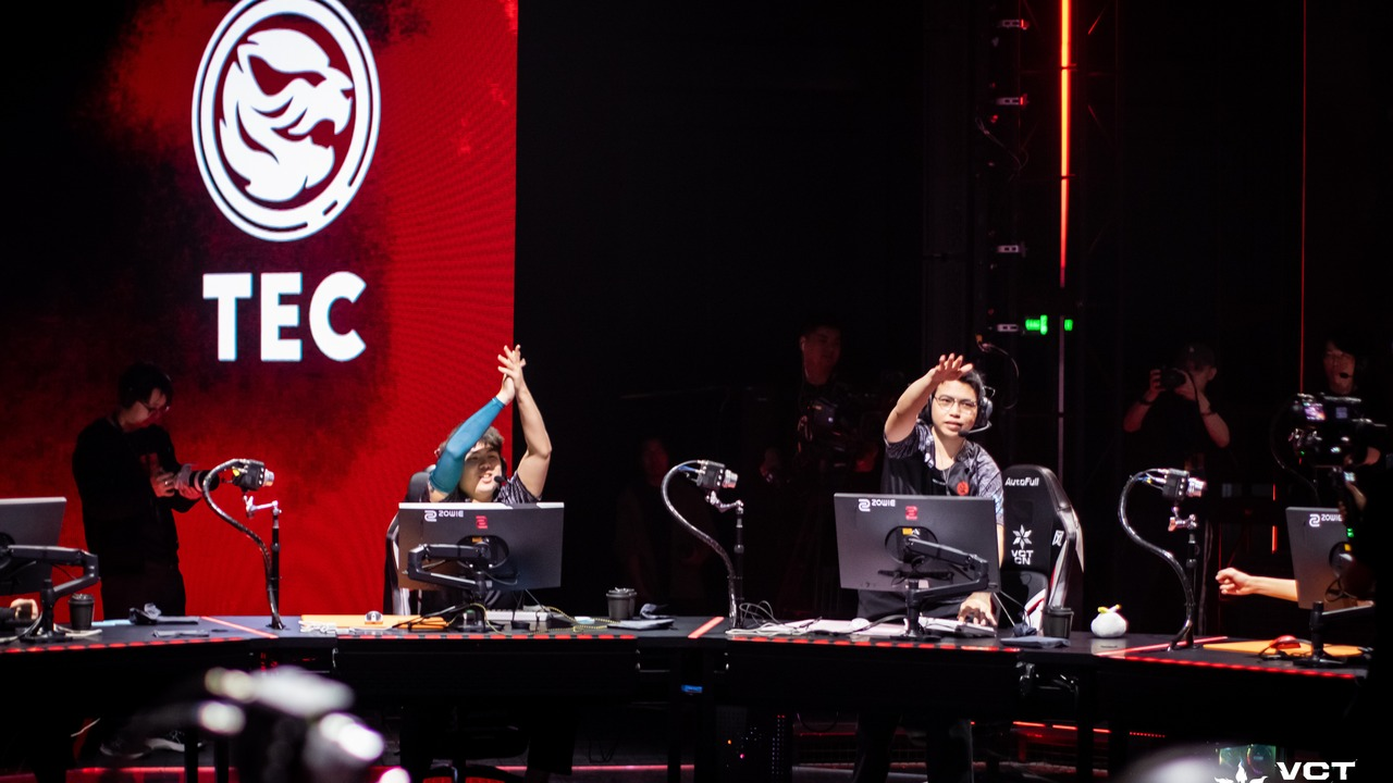 Titan Esports Club players acknowledge the crowd from the stage