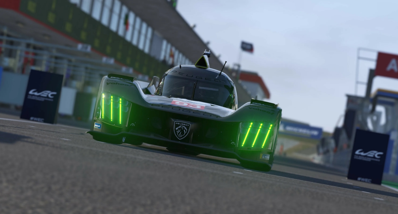 Prototype race cars lined up on the track at Le Mans Ultimate