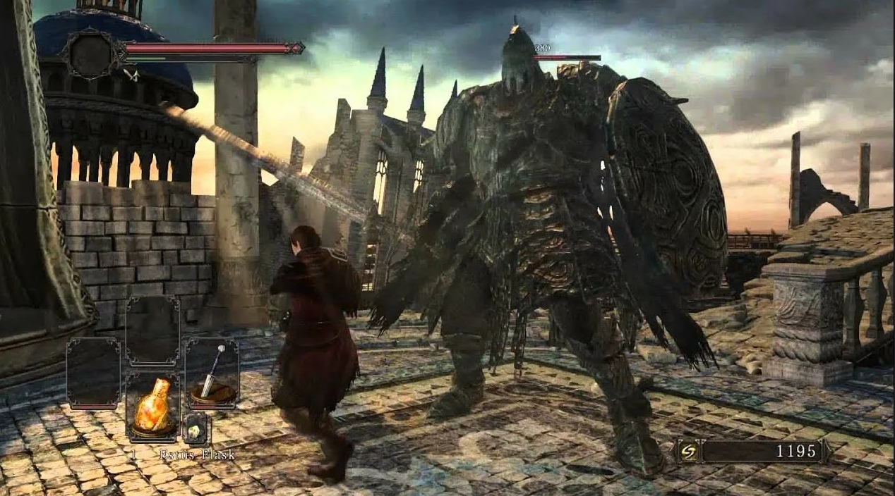 Dark Souls 2 boss fight against large armored knight in ruined castle