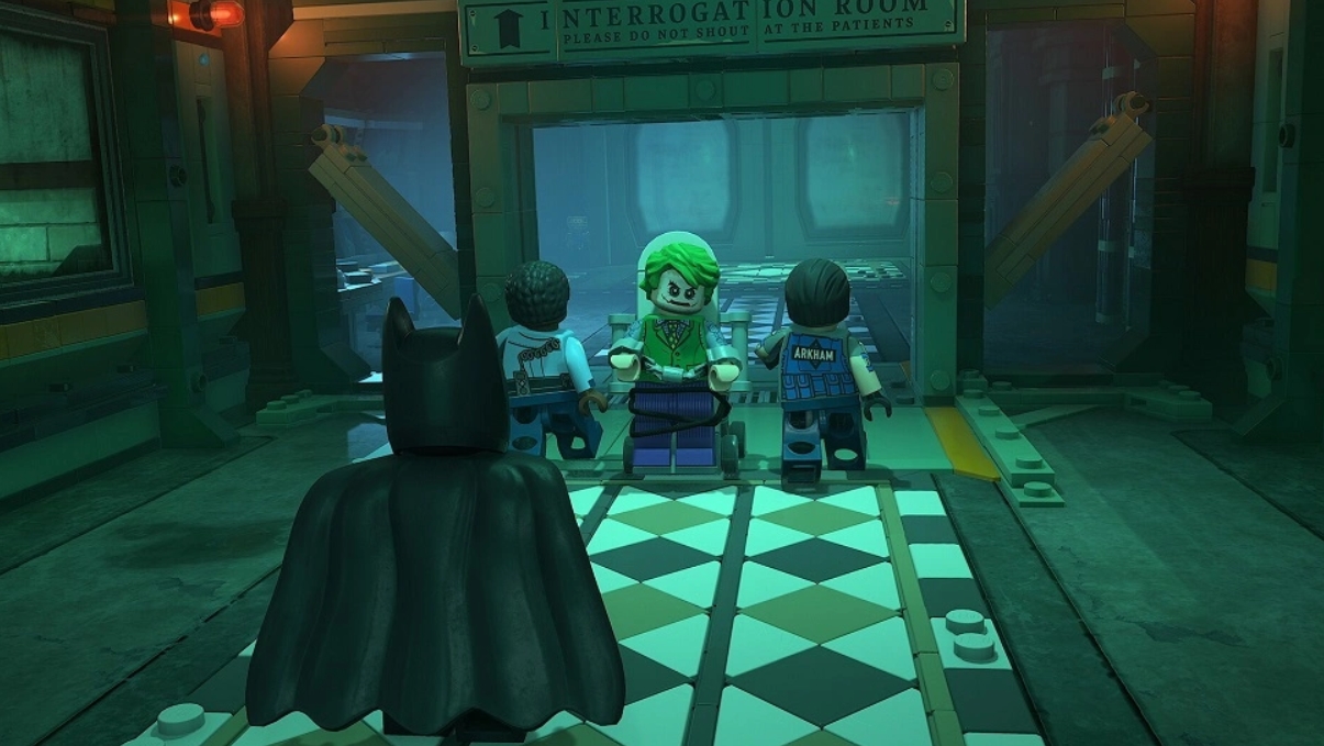 Batman chasing the Joker inside Arkham Asylum in LEGO Batman Legacy of the Dark Knight