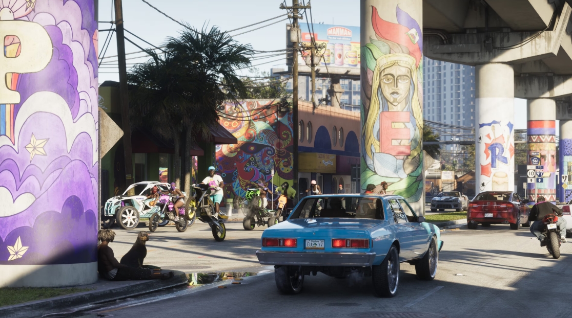 Vice City street in GTA 6 featuring cars, motorcycles, and colorful graffiti murals