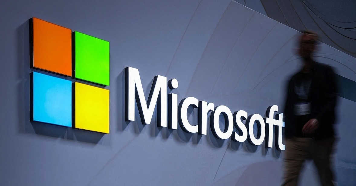 Microsoft logo outside the company's office building featured in coverage of the new antitrust lawsuit against Microsoft and Valve