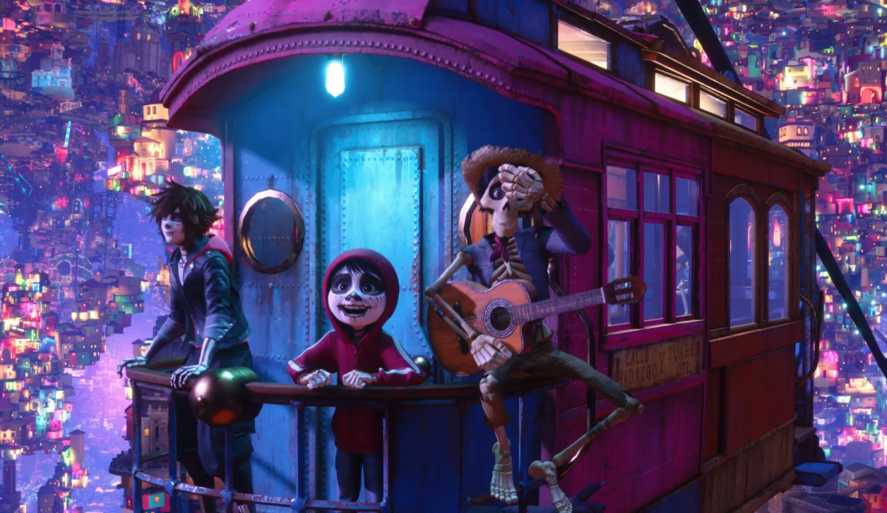 Miguel with calavera face paint and a guitar-playing skeleton riding a trolley above the glowing Land of the Dead — Coco world scene from the Kingdom Hearts IV trailer