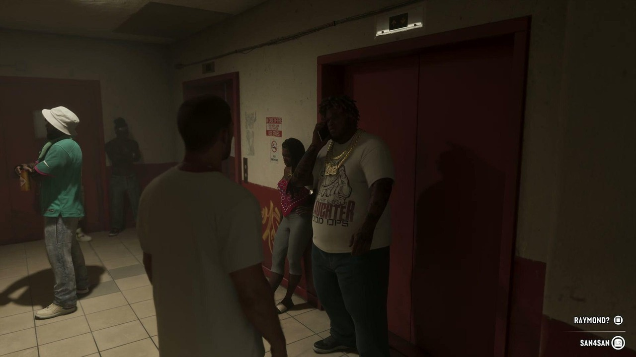 GTA VI characters speak inside a dimly lit room