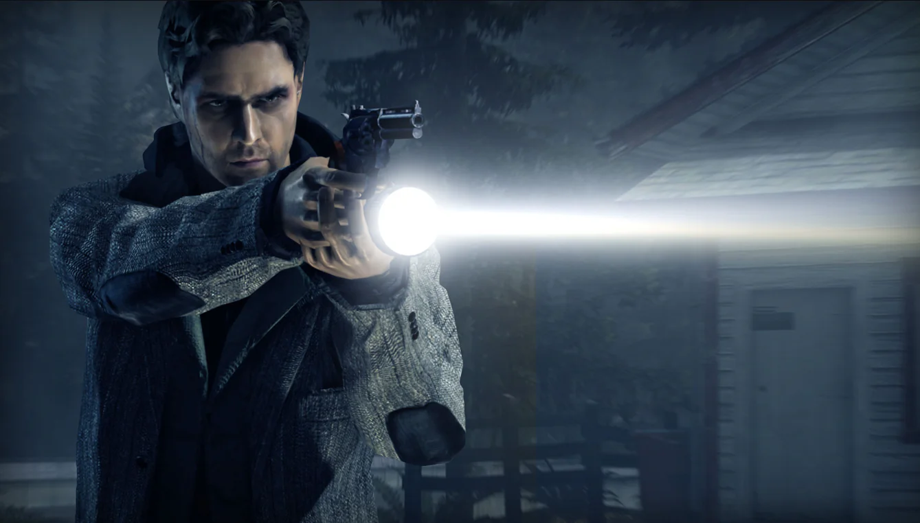 Alan Wake with a gun and a flashlight